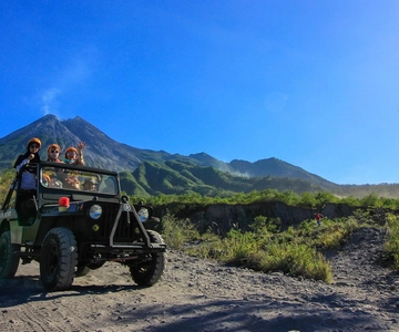 Merapi volcano sunrise with 4wd jeep and step on cold lava