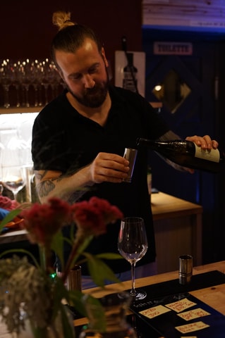 6-Tier Hungarian Wine Tasting at a Cozy Community Table