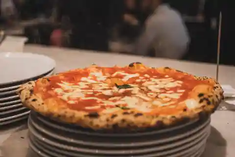 Clase de elaboración de pizza en Pompeya