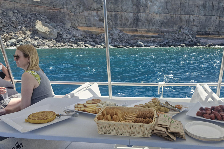 Puerto Rico, Grande Canarie : excursion en bateau, boissons, repas, paddle surf, plongée avec tuba.Profitez du paddle surf et de la plongée avec tuba dans les criques de Grande C