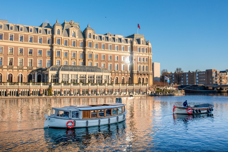 Amsterdã: cruzeiro de 2 horas pelo canal, incluindo opção de lanches e bebidas holandesasCruzeiro de 2 horas pelo canal, incluindo lanches holandeses e bebidas + guia