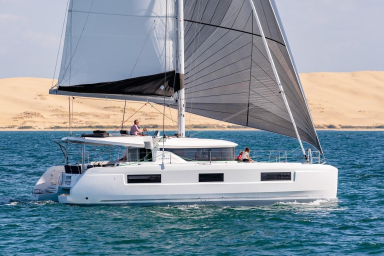 Pasito Blanco: Private catamaran excursion with food & drink 4 hour trip