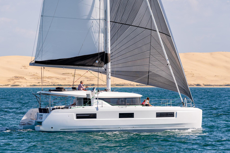 Pasito Blanco: Private catamaran excursion with food & drink 8 hours