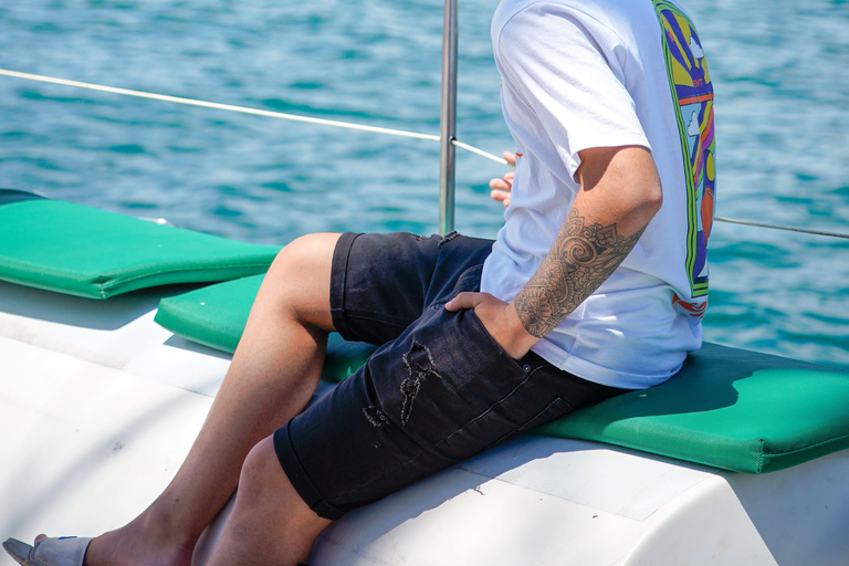 Sailing catamaran ride through Cova Tallada and optional swim stop Catamaran sailing trip to Cova Tallada, no swim, with access to the net