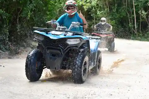 Cancun: Aventura na selva em quadriciclo com tirolesa e mergulho em cenote