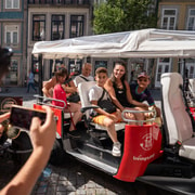 Porto: Guided City Tour by Tuk-Tuk and Douro River Cruise | GetYourGuide