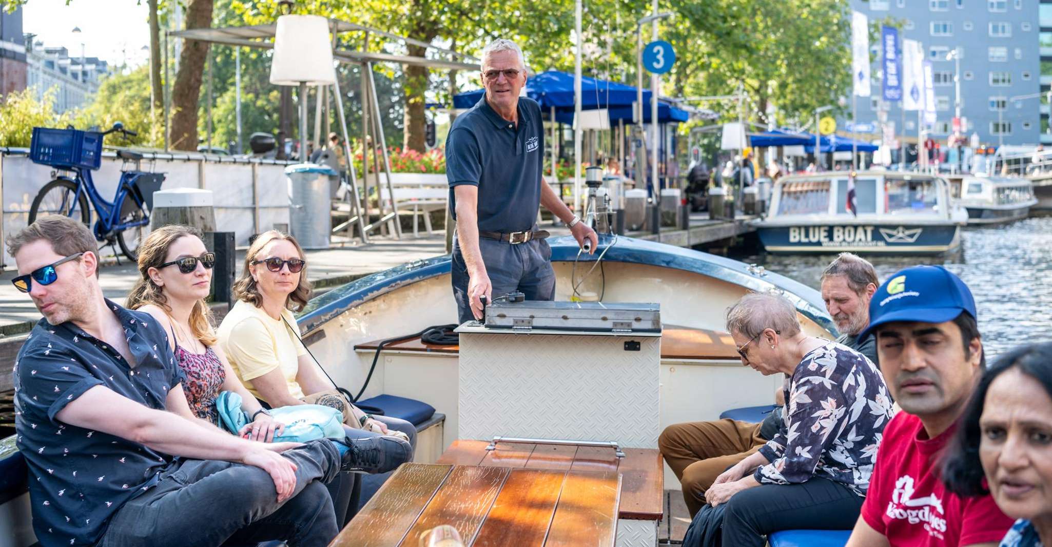Amsterdam: Guided City Highlights Open Boat Canal Cruise
