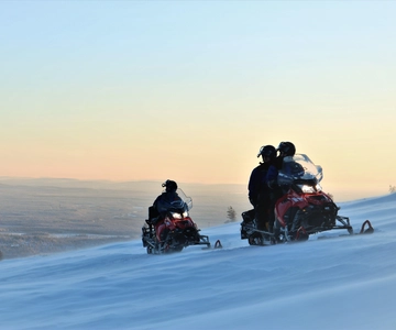King of Ylläs: Snowmobiling to the Hill