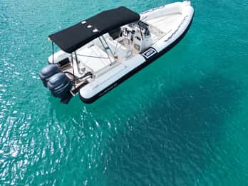 San Antonio: Private Boat Experience with Paddle Surfing and Snorkeling