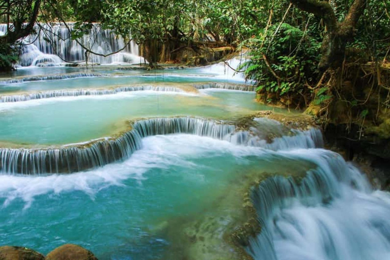 Luang Prabang: Alms Giving, Waterfall & Temple Tour