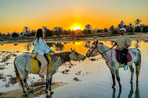 Horseback riding at sunset on the peaceful beaches of Djerba.