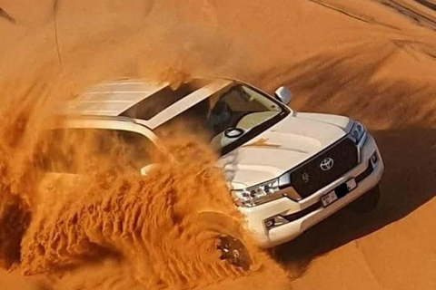 Doha: quad, buggy, sandboarding e giro in cammelloSafari privato nel deserto con buggy e giro in cammello