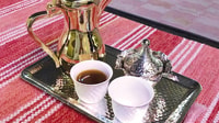 Nizwa Sunset Serenity, Omani Coffee and Dates at a Hilltop - Housity