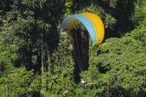 From Guatape: Paragliding over Guacaica Jungle