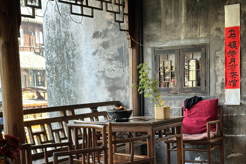 Hangzhou: Wuzhen Water Town Day Trip with Boat Ride Guide for English