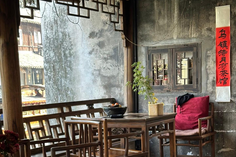 Hangzhou: Wuzhen Water Town Day Trip with Boat Ride Guide for English