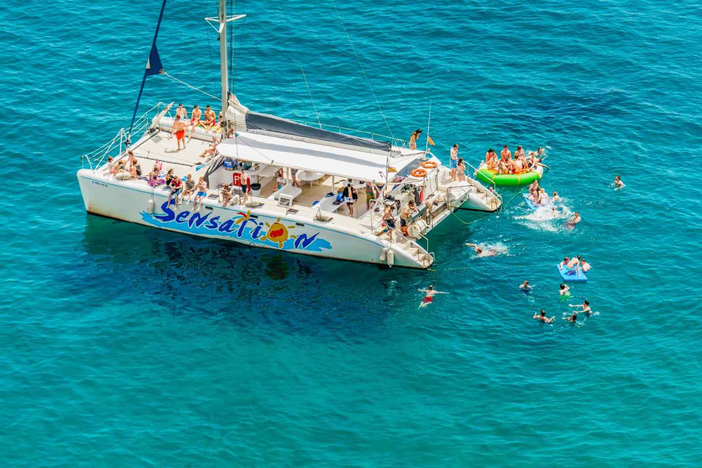 water sports in barcelona | barcelona: catamaran party cruise with bbq meal
