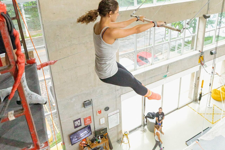 Fly high on a trapeze in the city of Sao Paulo