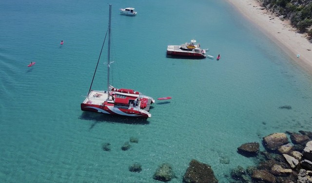 Visit Santa Giulia cruise on a maxi-caps in sails in Porto-Vecchio, Corsica, France