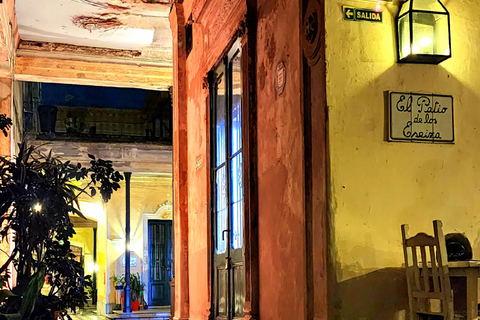 Buenos Aires: tango in an old tenement house + glass of wine.