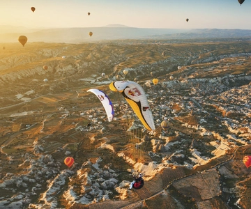 From Urgüp/Göreme: Cappadocia Tandem Paragliding & Transfer