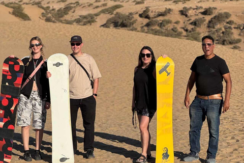 Expérience dans le désert de Timlalin au coucher du soleil, balade à dos de chameau et spectacle de feuExpérience au coucher du soleil dans le désert de Timlalin, balade à do