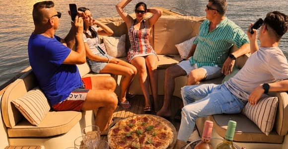 Lisbon Sunset Cozy Boat Cruise with Open Bar & Pizza