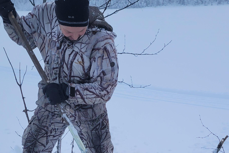 Rovaniemi: Ice Fishing, Snowmobile, and Net Fishing Tour