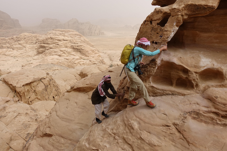 From Wadi Rum: Hike a Mountain with Guide & Stay (optional) Burdah Rock Bridge Mountain Day & Free Lunch Only