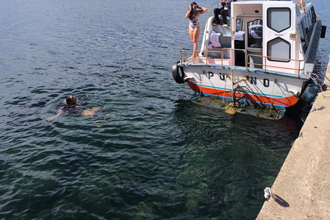 Dive into Uros and Taquile with a workshop, lunch, and a swim in Lake Titicaca