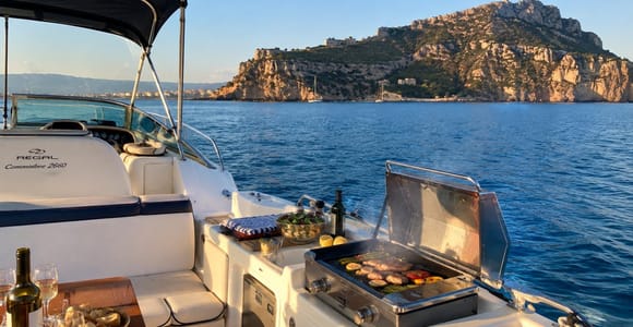 Cagliari: Private Boat Trip with Barbecue at Anchor
