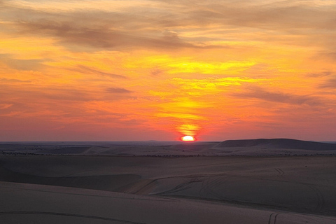 Sunrise or Sunset desert Safari with Sandboarding in Qatar