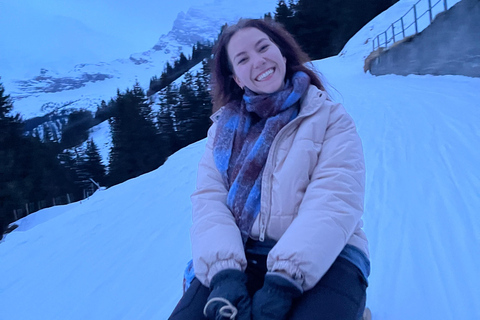 Interlaken: Sunset Sledding Adventure & Swiss Cheese Fondue Interlaken: Sunset Sledding & Fondue Dinner in Mürren