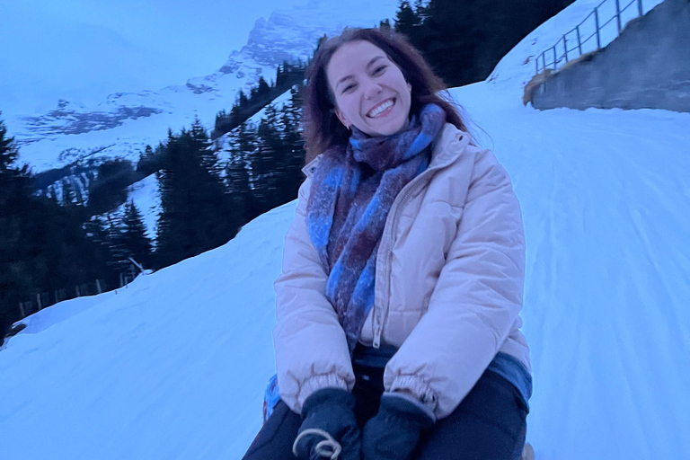 Interlaken: Sunset Sledding Adventure & Swiss Cheese Fondue Interlaken: Sunset Sledding & Fondue Dinner in Mürren