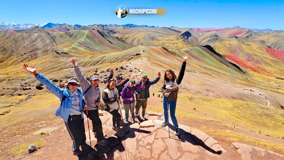 Striped highland ridges and a stone forest beneath a wide Andean sky