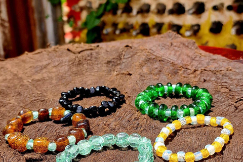 Kampala: Glassblowing, Beadmaking, and More Art Experience Blowing Glass Bubbles