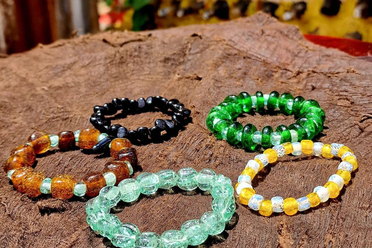 Kampala: Glassblowing, Beadmaking, and More Art Experience Blowing Glass Bubbles