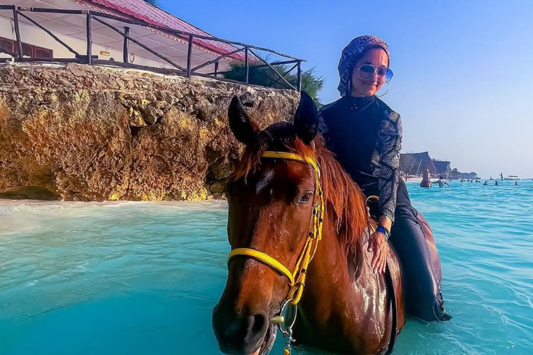 Zanzibar: Ridtur och dhow-kryssning i solnedgångenGrupp på 5 eller fler