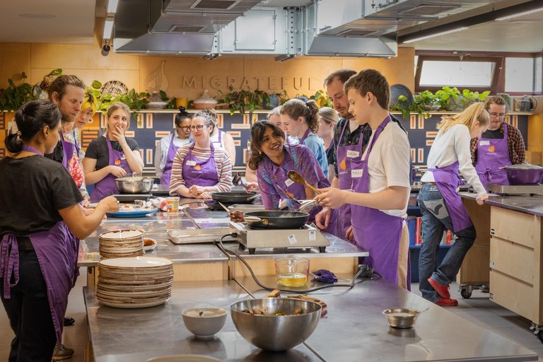 Bristol: Cook Authentic Family Recipes with a Refugee Chef Cooking class with drinks, nibbles, and apron souvenir