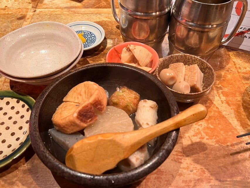 Guided Tour of Izakaya with Food and Drinks | GetYourGuide