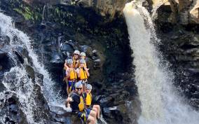 Umauma Triple-Tier Waterfall Rappel and River Tour
