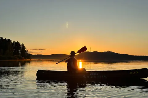 Ruka : Summer evening canoeing on the lake Rukajärvi