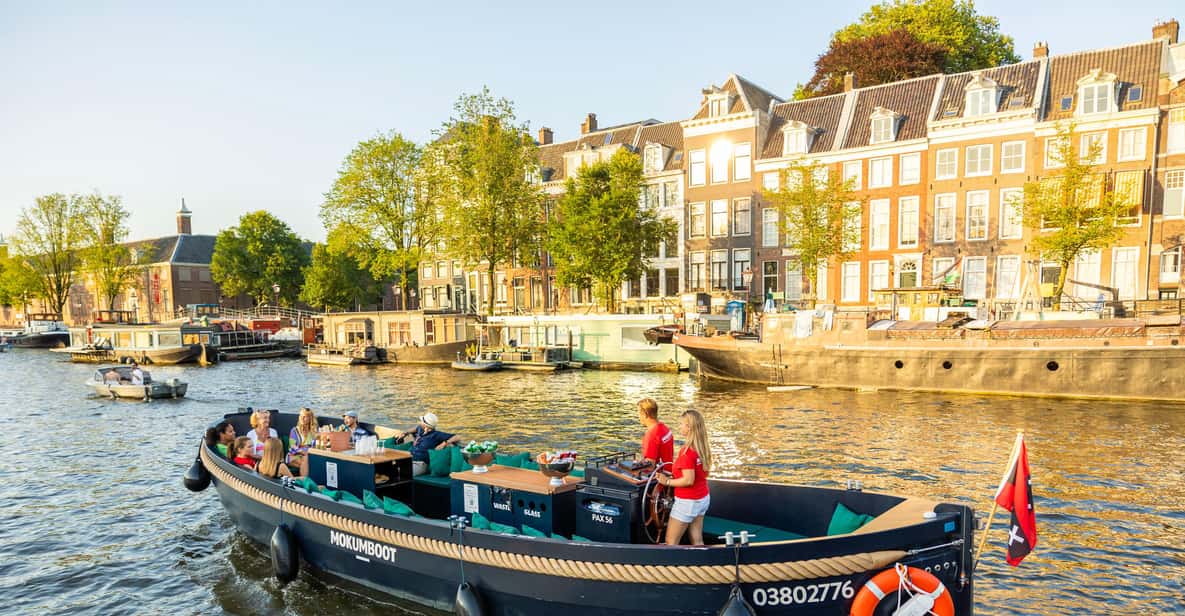 Afbeelding 7 van Amsterdam: begeleide open boottocht met onbeperkt drankjes