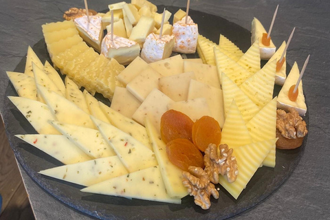 Vanuit Zürich: Thun-tour, Beatusgrotten, boottocht op het meer en kaas