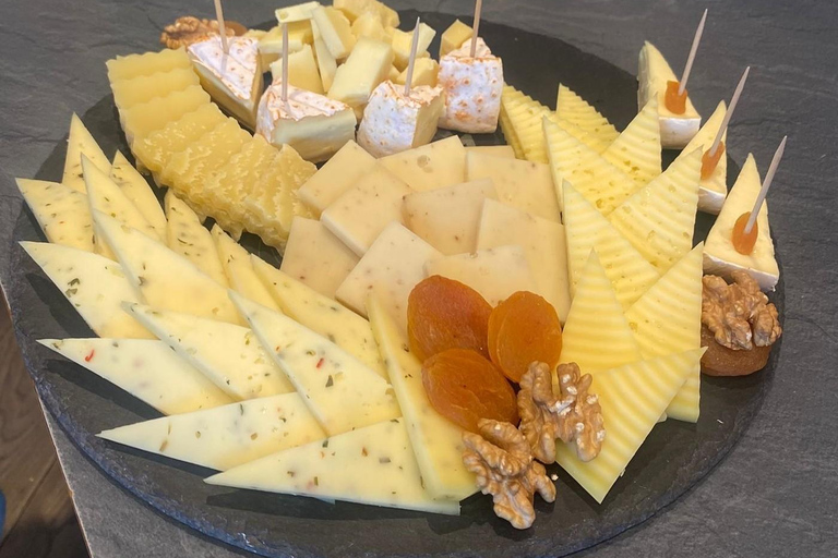 Vanuit Zürich: Thun-tour, Beatusgrotten, boottocht op het meer en kaas