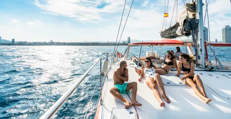 Barcelona: Sunset or Day Catamaran Cruise with Tapa & Drink photo 5