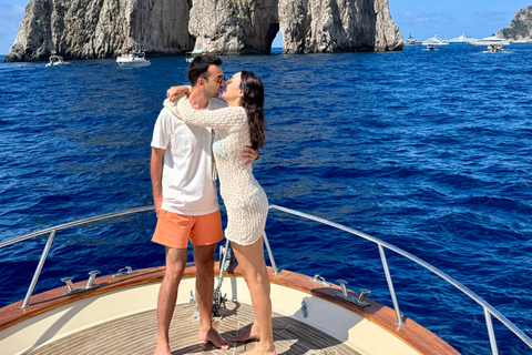 Capri Boat Tour with Caves, Swimming, Aperitif and Champagne From Capri: PRIVATE Capri Boat Tour