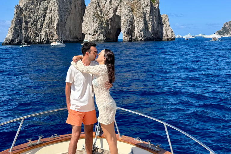 Capri Boat Tour with Caves, Swimming, Aperitif and Champagne From Capri: PRIVATE Capri Boat Tour