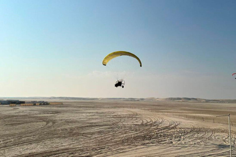 Doha: Amazing Sealine Paratriking Experience with PicknDrop