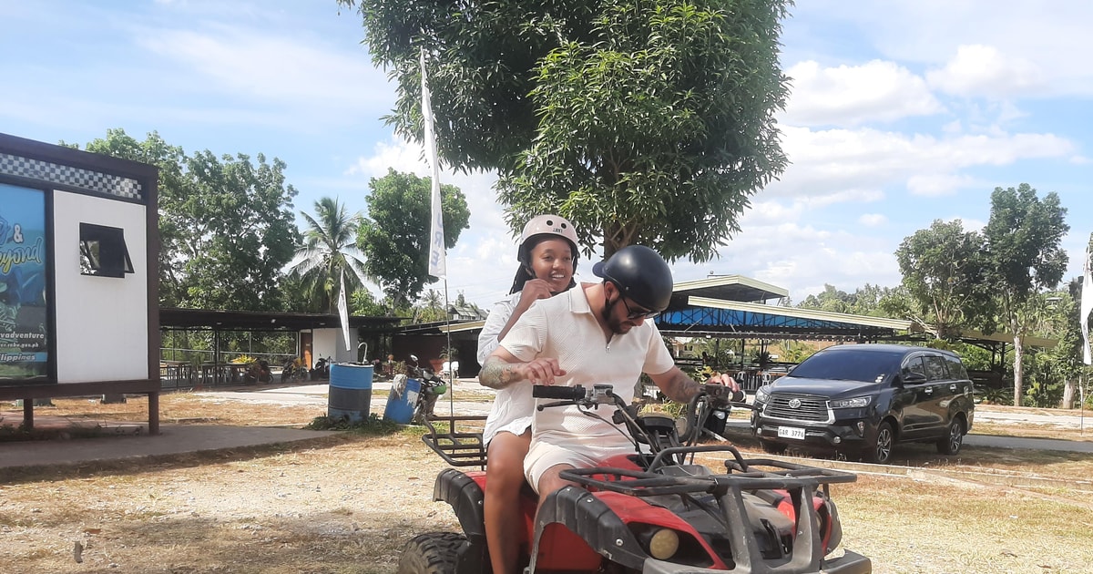 ATV Mantayupan Falls Pescador Island Hopping Meals GetYourGuide